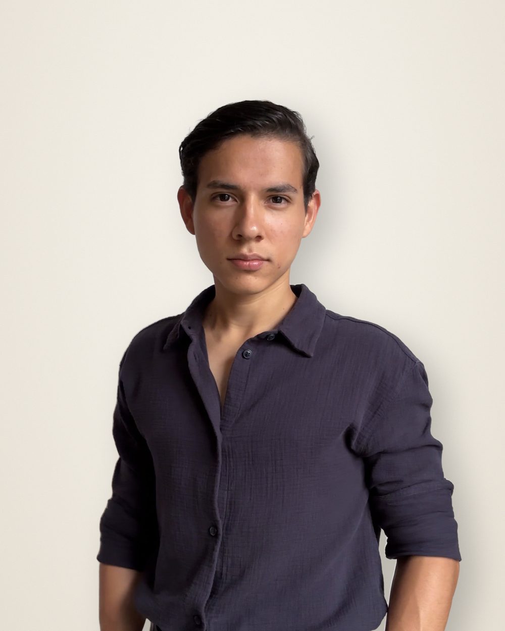 Mario Ledezma, founder of SmoothScales, facing the camera in a charcoal blue shirt